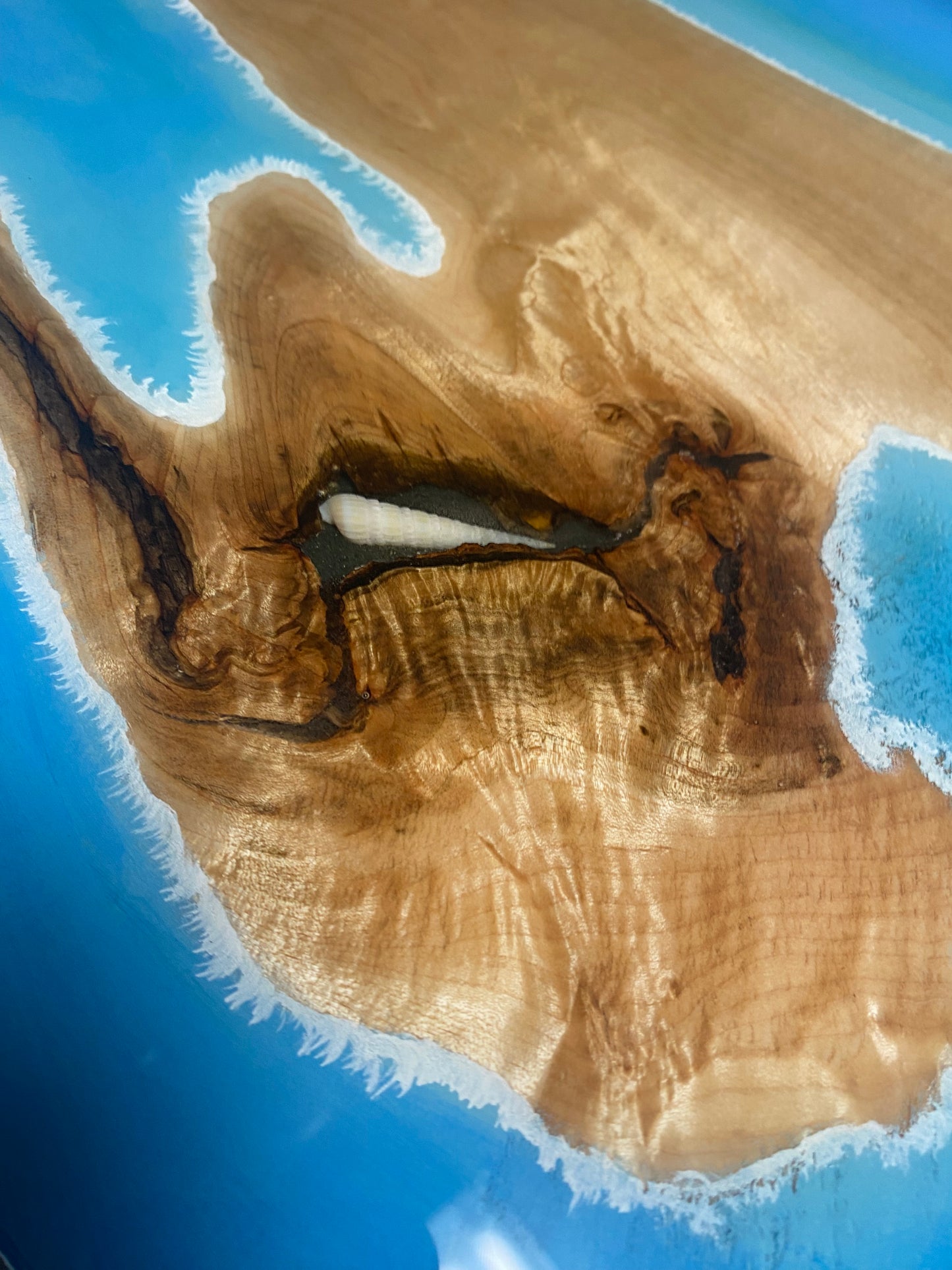 Table with inlayed shells and epoxy coat, coffee table