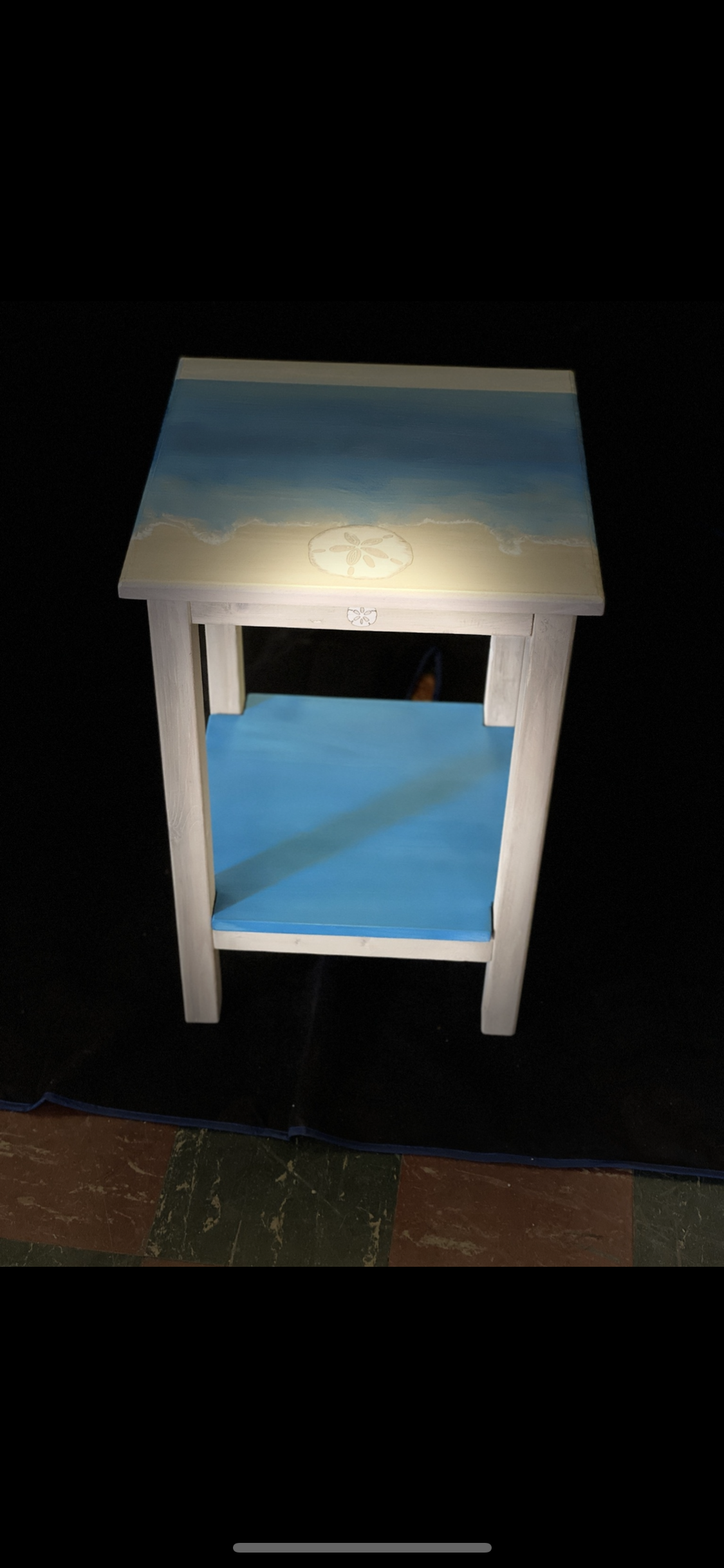 Oceanic End table with signature icon