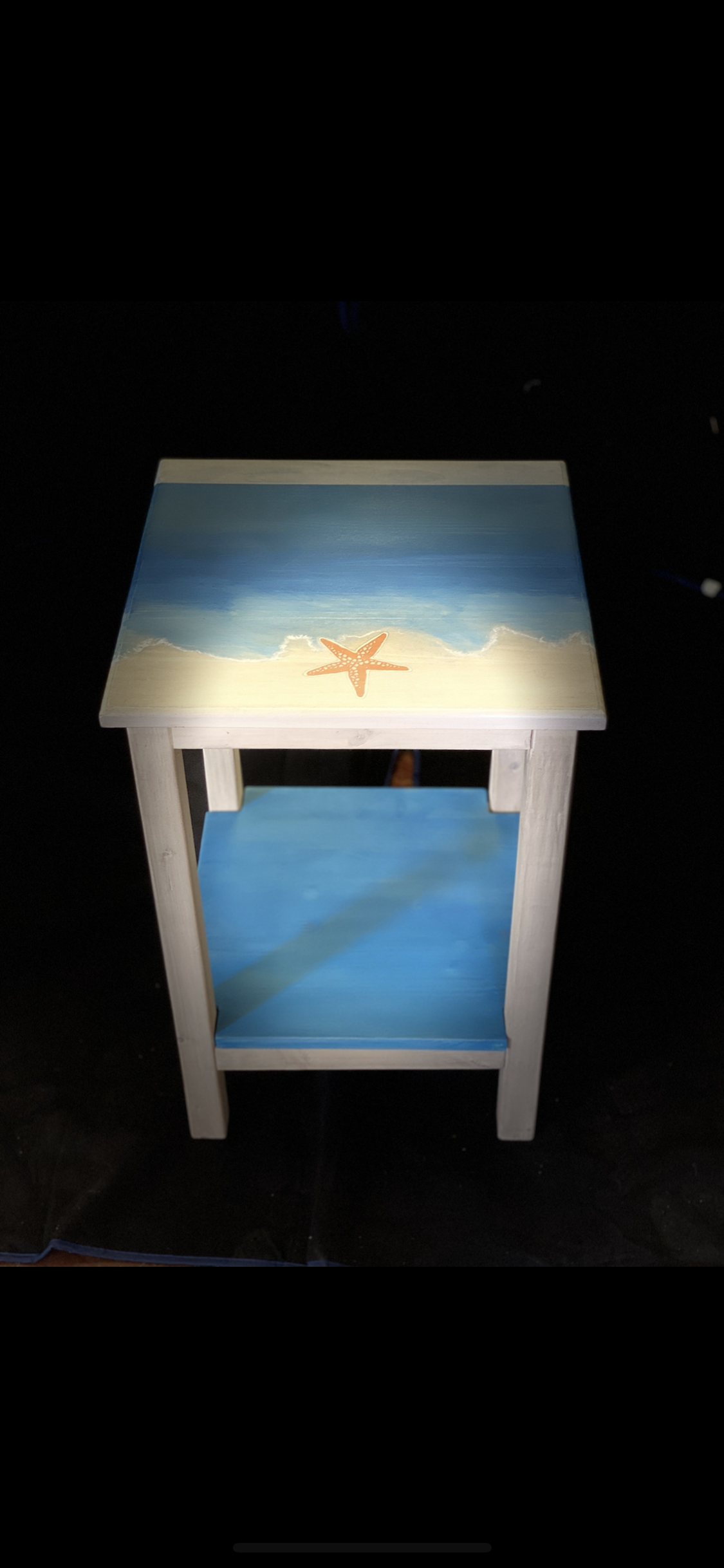 Oceanic End table with signature icon